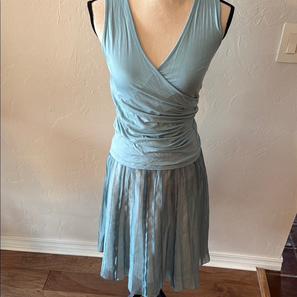 Elegant Blue Sleeveless surplice knit top & skirt.